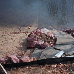 170' of Lake Oakland frontage. We used 2-4' Canadian red granite boulders. Features included a landward and waterward beach with natural grindstone steps and Metal Craft Dock.