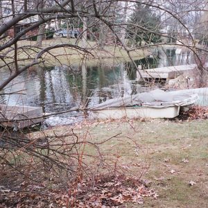 Mucky canal seawall with 10' tall PVC sheeting.