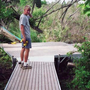 220' Metal craft dock that makes a custom Right turn with two 8X8 platforms. Accessories included stairs, bumpers cleats and custom pads for the deep muck present on this installation.