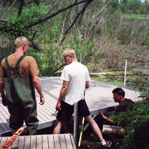220' Metal craft dock that makes a custom Right turn with two 8X8 platforms. Accessories included stairs, bumpers cleats and custom pads for the deep muck present on this installation.